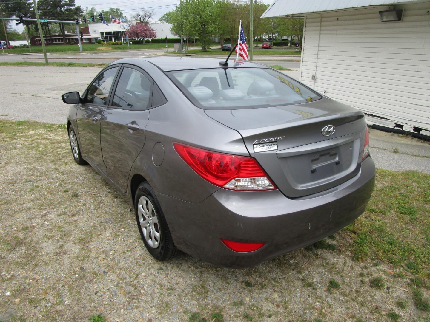 2014 Gray Hyundai Accent GLS 4-Door (KMHCT4AE9EU) with an 1.6L L4 DOHC 16V engine, Automatic transmission, located at 2553 Airline Blvd, Portsmouth, VA, 23701, (757) 488-8331, 36.813889, -76.357597 - ***VEHICLE TERMS*** Down Payment: $999 Weekly Payment: $75 APR: 23.9% Repayment Terms: 42 Months *** CALL ELIZABETH SMITH - DIRECTOR OF MARKETING @ 757-488-8331 TO SCHEDULE YOUR APPOINTMENT TODAY AND GET PRE-APPROVED RIGHT OVER THE PHONE*** - Photo#7